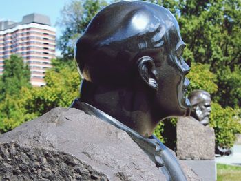 Close-up of statue against building