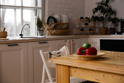 Fresh farmers tomatoes and basil on wood table.