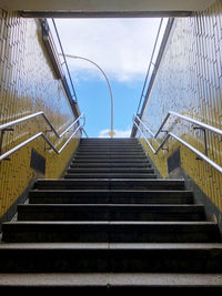 Low angle view of staircase against sky