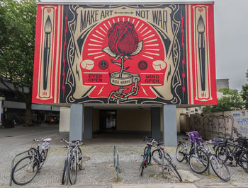 Bicycles parked on road sign