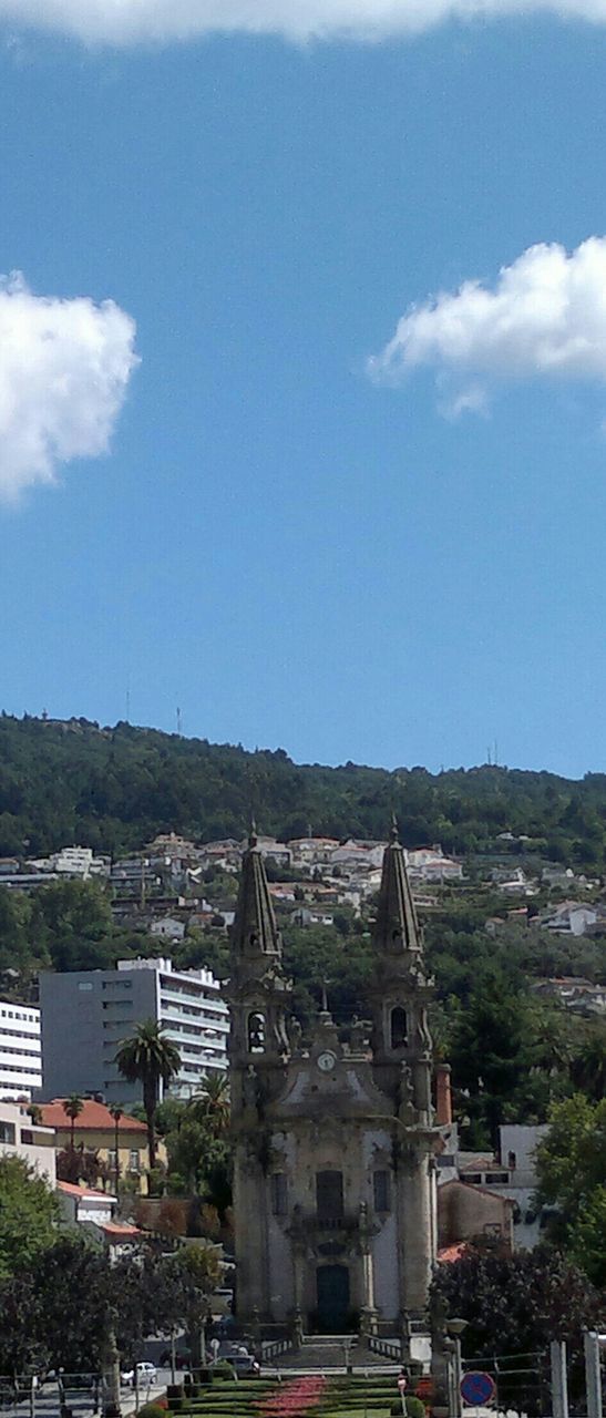 architecture, built structure, building exterior, sky, town, high angle view, residential building, house, residential district, residential structure, mountain, city, tree, townscape, cityscape, blue, history, crowded, day, cloud - sky