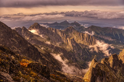 Panoramic view of mountains against sky during sunset