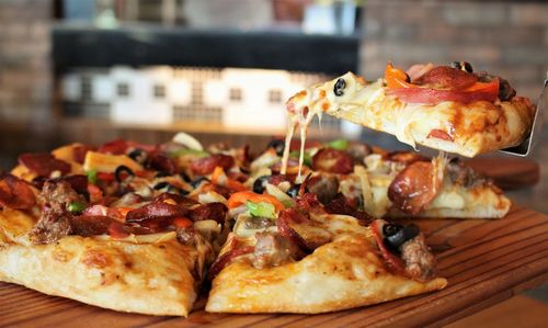 Close-up of pizza served in plate