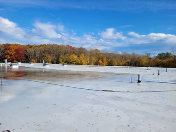 Scenic view of lake against sky during autumn