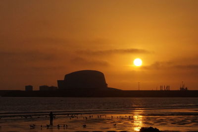 Scenic view of sunset over sea