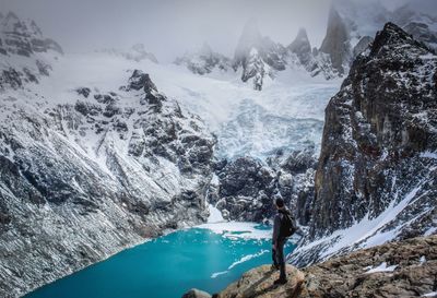 Scenic view of snow covered mountains against sky