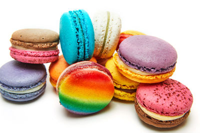 Close-up of macaroons on white background