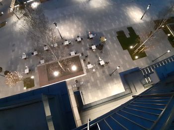 High angle view of illuminated buildings in city at night