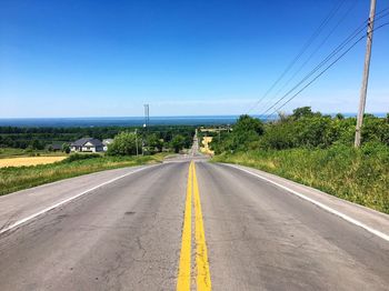 Empty country road along landscape