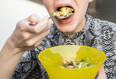 Woman eating a salad