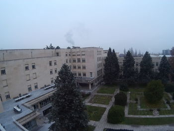 View of buildings in city against sky