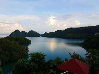 Scenic view of lake against sky during sunset