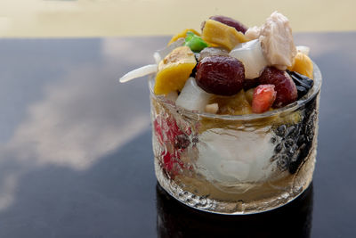 Close-up of ice cream in glass on table