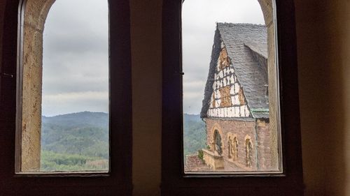 Buildings seen through window