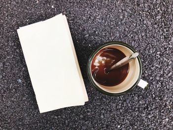 High angle view of coffee cup on table