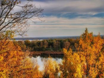 Scenic view of lake against sky during autumn