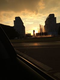 Silhouette of city at sunset