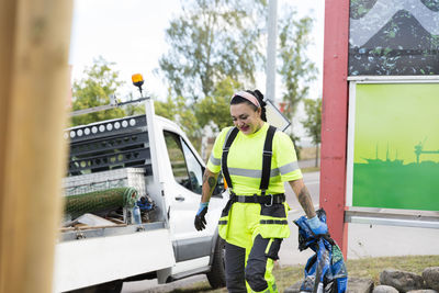 Female worker doing landscaping work