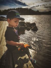 Boy playing in a lake