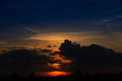 Low angle view of dramatic sky during sunset