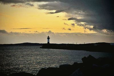 Scenic view of sea at sunset
