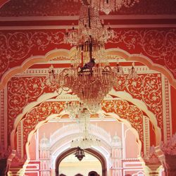 Low angle view of ornate ceiling in temple