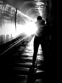 People walking on railroad track