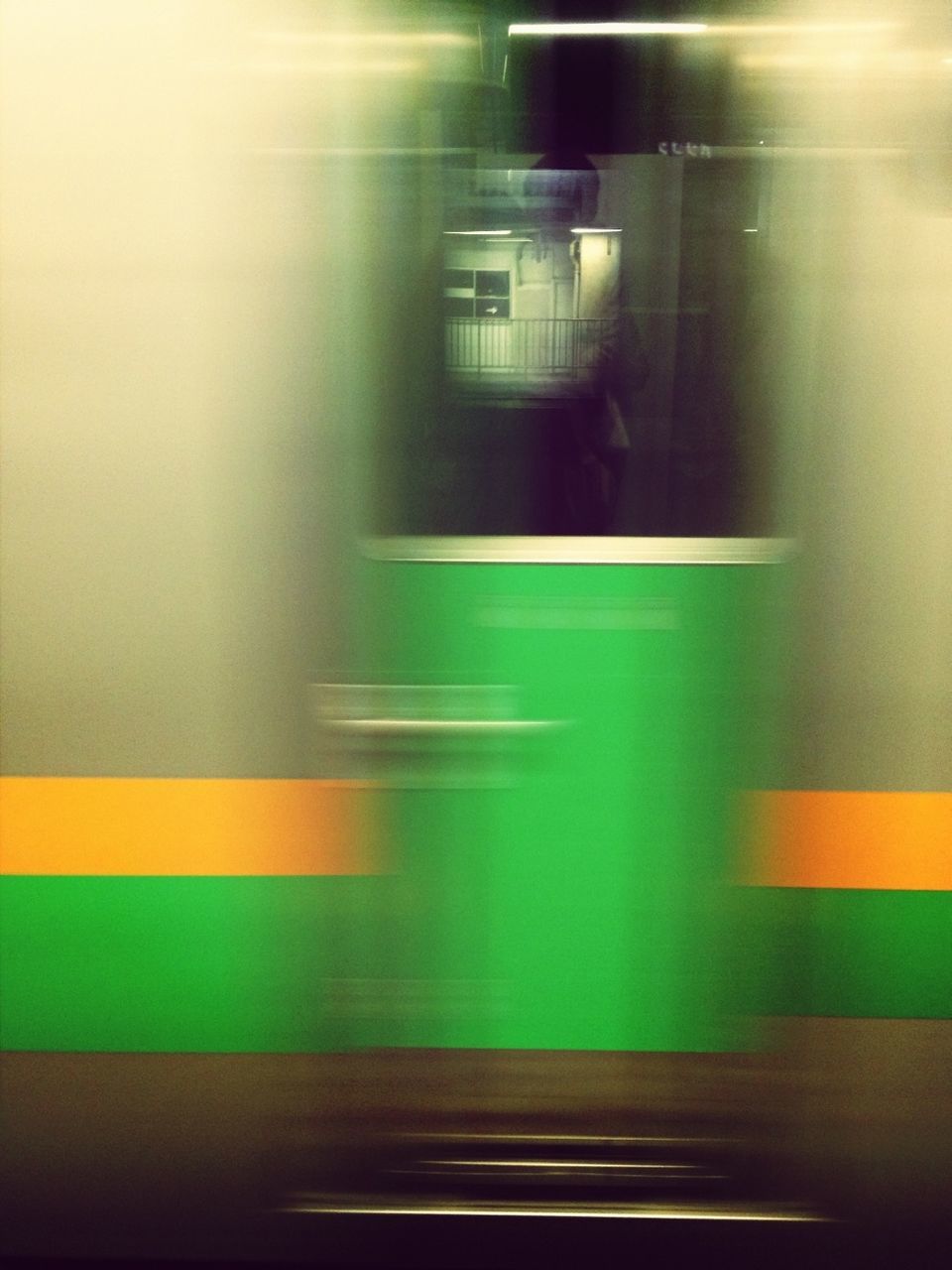 indoors, illuminated, transportation, mode of transport, public transportation, blurred motion, on the move, motion, train - vehicle, subway station, window, vehicle interior, travel, glass - material, transparent, railroad station, subway, speed, lighting equipment, land vehicle