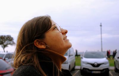 Portrait of young woman looking away