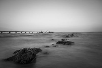 Scenic view of sea against clear sky