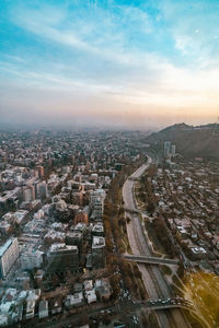 High angle view of townscape against sky during sunset