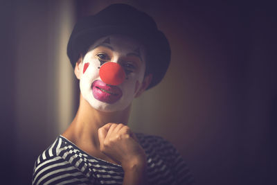 Portrait of young woman wearing mask