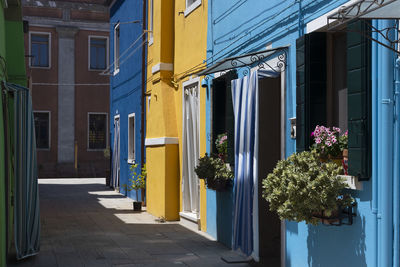 Perspective of a multicolore street with the hause in a row