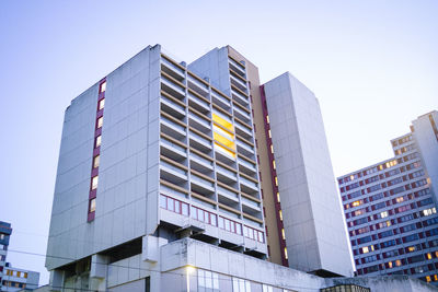 Low angle view of modern buildings against clear sky