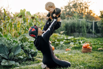 Father and son on field