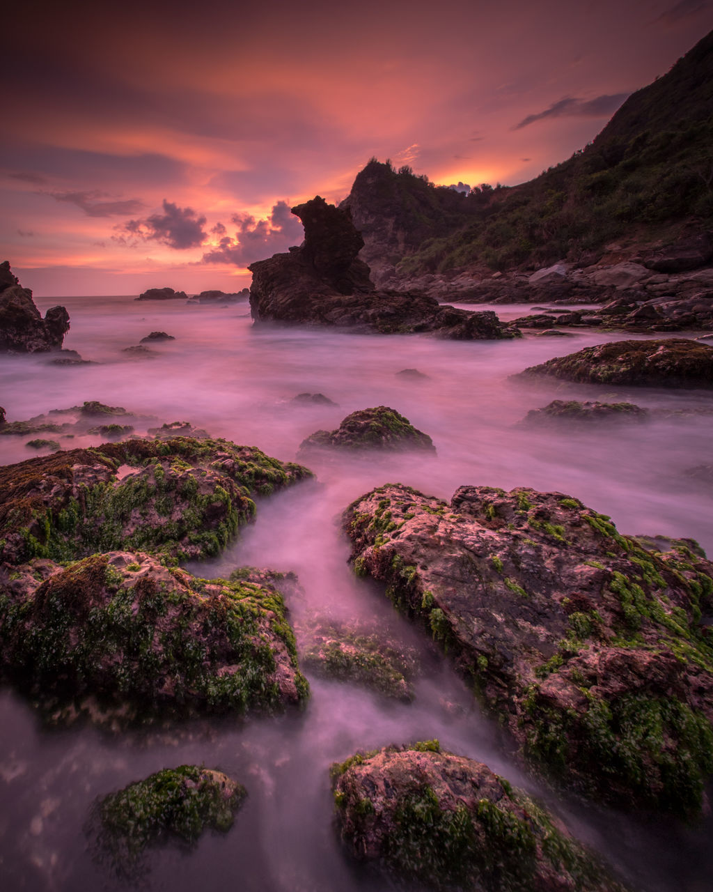 SCENIC VIEW OF SEA AGAINST ORANGE SKY