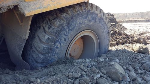 Close-up of truck tire on land