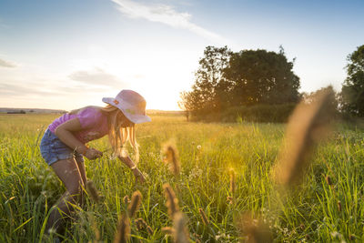 Woman standing in field