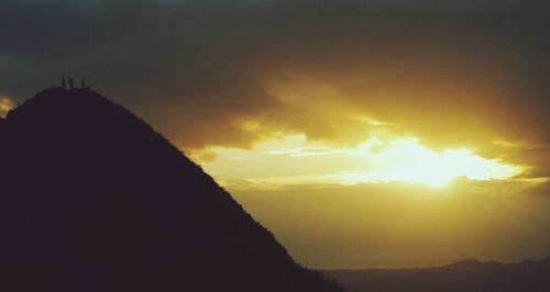 Scenic view of mountains at sunset