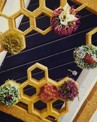 Low angle view of flower bouquet hanging on plant