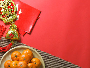 Close-up of orange fruits on table