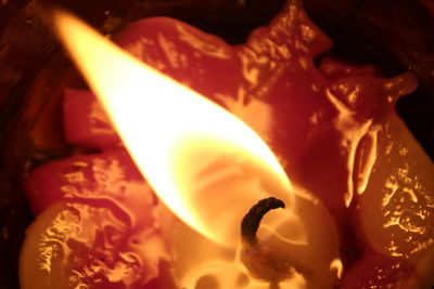 Close-up of illuminated candle