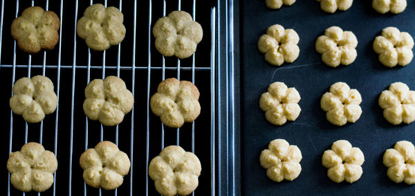 High angle view of cookies against black background