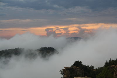 Scenic view of mountains against sky during sunset