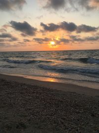 Scenic view of sea against sky during sunset