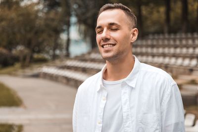 Portrait of young man looking away