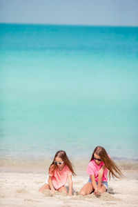 Girls playing at beach