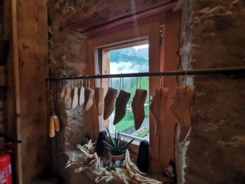 Close-up of clothes hanging on wall