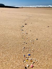 Close-up of sand on beach