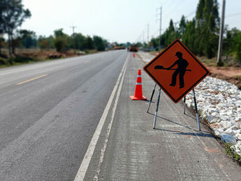 Road sign on street in city